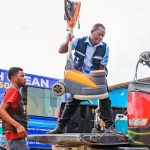 Posh Clean Services team loading cleaning equipment onto the branded company truck in Accra