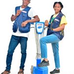 Posh Clean Services team member with professional cleaning equipment