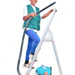 Posh Clean Services team member with professional cleaning equipment
